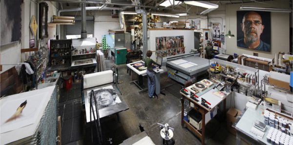 a panoramic image of the press room of a fine art publisher
