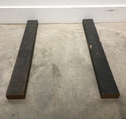 Here are two 2x4 wood risers that will keep a stack of artworks off the floor.  This should help protect your artwork from a possible water leak.