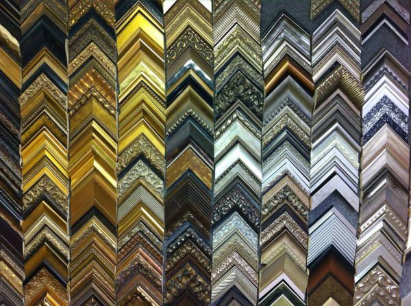 image of a wall of frame samples, Informational posts FAE created for their Design Blog.